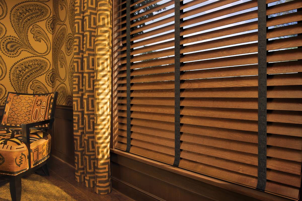 Hunter Douglas blinds and curtains adorning a living room window near Richmond, VA