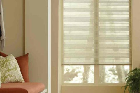 Hunter Douglas metal blinds in a reading nook near Richmond, VA.