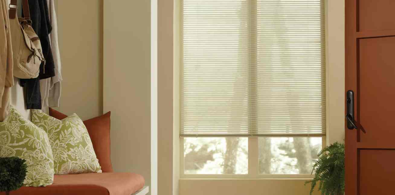 Hunter Douglas metal blinds in a reading nook near Richmond, VA.