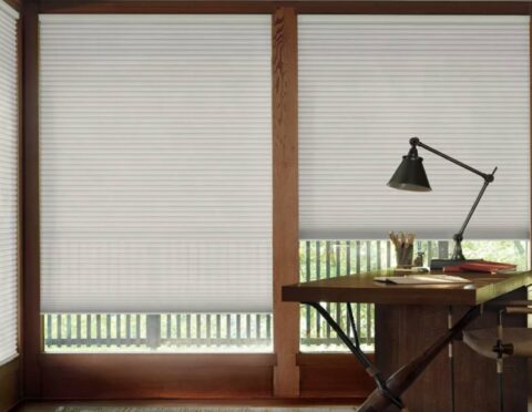 Hunter Douglas Duette® Cellular Shades blocking light in a home office near Richmond, VA.