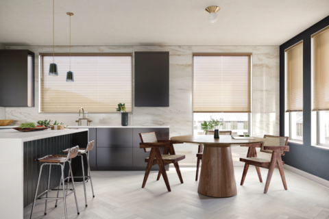 Hunter Douglas Modern Precious Metals® Mini Blinds covering windows in a modern kitchen.