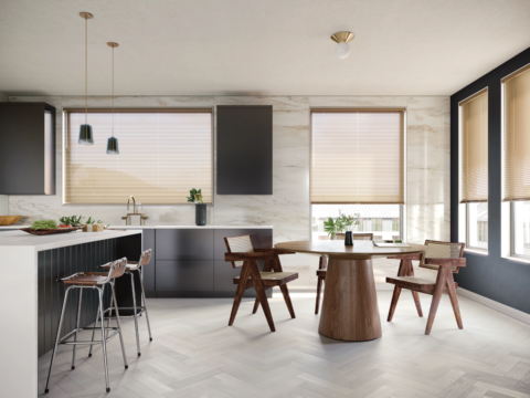 Hunter Douglas Modern Precious Metals® Mini Blinds covering windows in a modern kitchen.